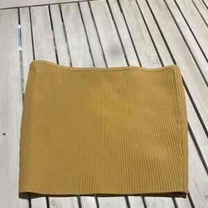 It’s a basic yellow tube top